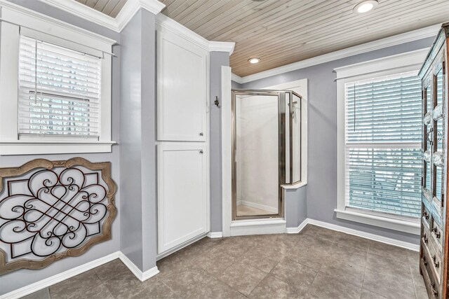 bathroom featuring crown molding, wooden ceiling, and tile patterned flooring