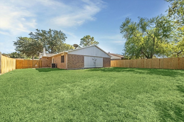 view of yard with central AC