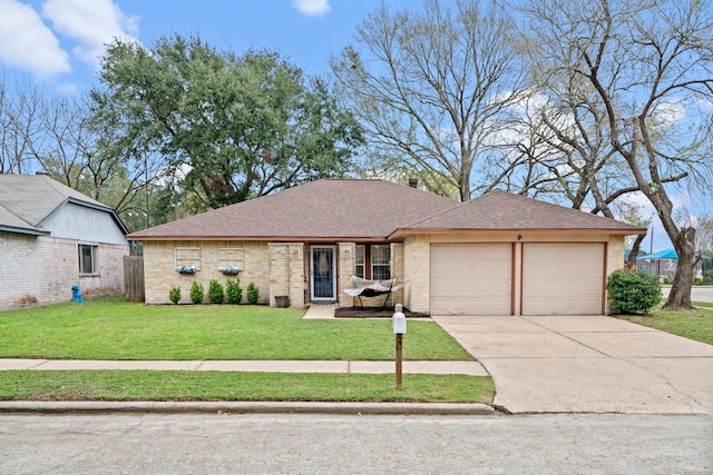 view of front facade featuring a garage and a front yard