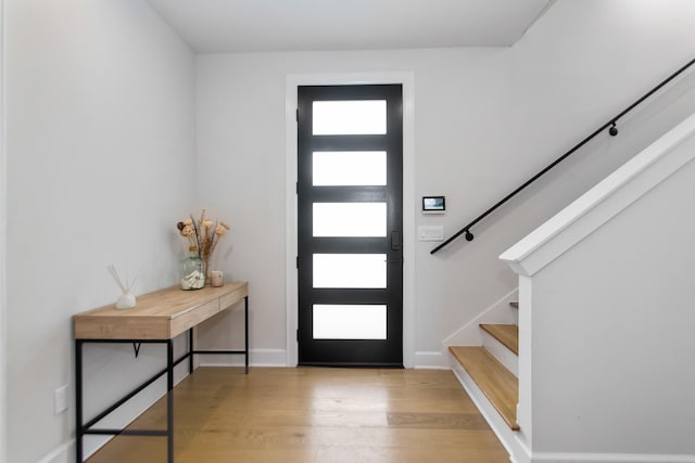 foyer with light wood-type flooring