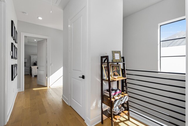 hallway featuring hardwood / wood-style flooring