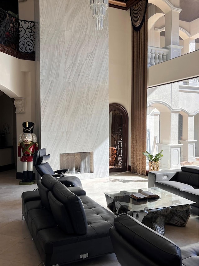 living room featuring a high ceiling