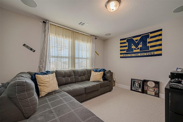 living room with dark carpet