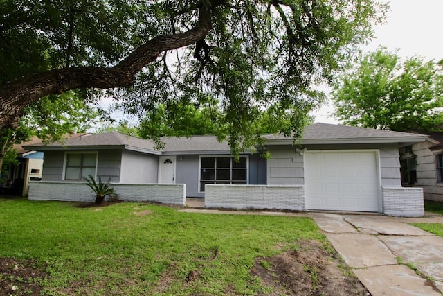 ranch-style house with a garage and a front yard