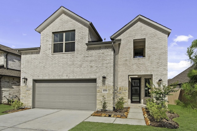 16710 Yaklin Meadow Ct, Humble, TX 77346 - view of front facade with a garage, concrete driveway, and brick siding