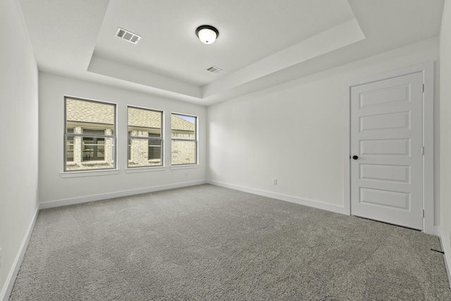 16710 Yaklin Meadow Ct, Humble, TX 77346 - carpeted spare room with a tray ceiling and baseboards