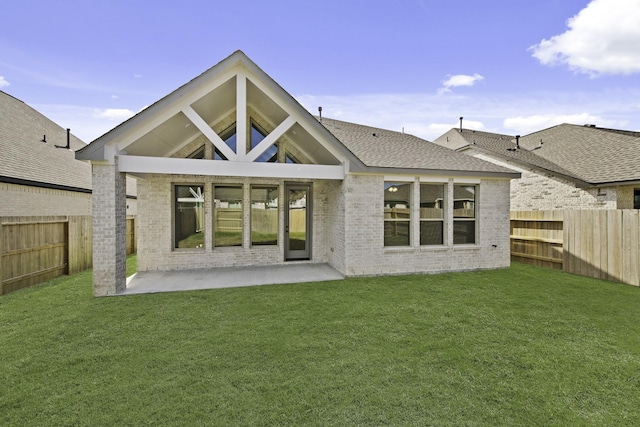 16710 Yaklin Meadow Ct, Humble, TX 77346 - back of house featuring brick siding, a fenced backyard, and a patio area