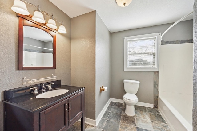 full bathroom with shower / tub combination, vanity, and toilet