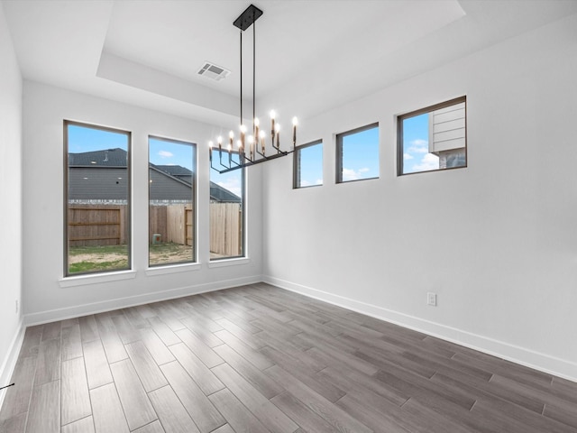 3248 Stingray Cove Dr, Katy, TX 77493 - unfurnished dining area featuring baseboards, an inviting chandelier, and visible vents