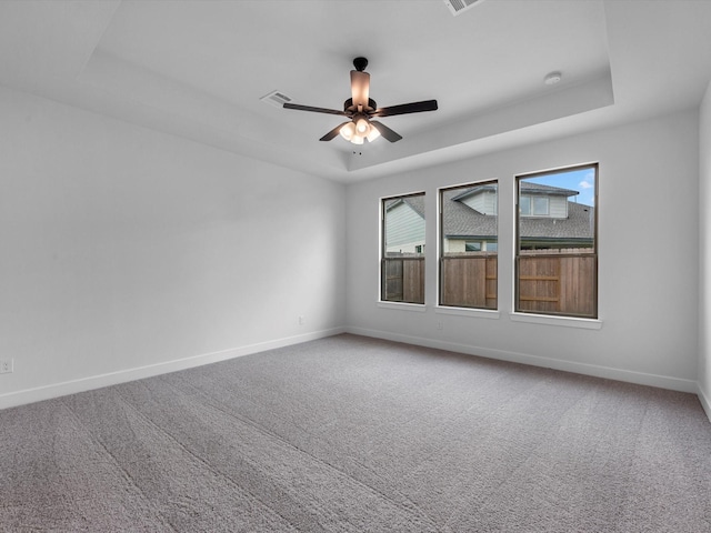 3248 Stingray Cove Dr, Katy, TX 77493 - carpeted spare room featuring baseboards, a raised ceiling, and ceiling fan