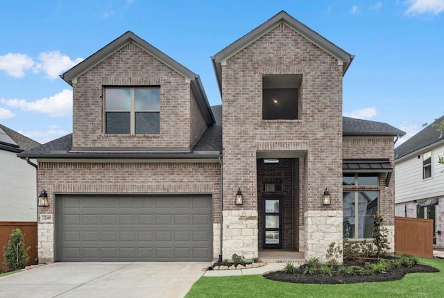 3248 Stingray Cove Dr, Katy, TX 77493 - view of front of property featuring concrete driveway, a shingled roof, and brick siding