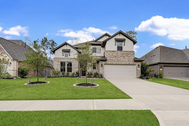 view of front of home with a garage and a front lawn