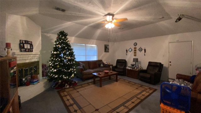 living room with vaulted ceiling and ceiling fan