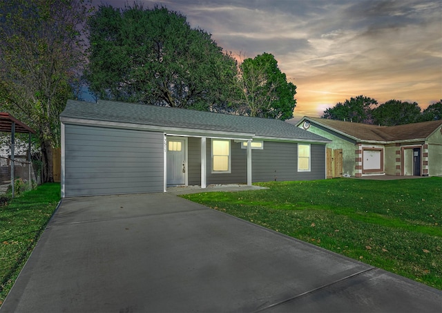 single story home featuring a yard