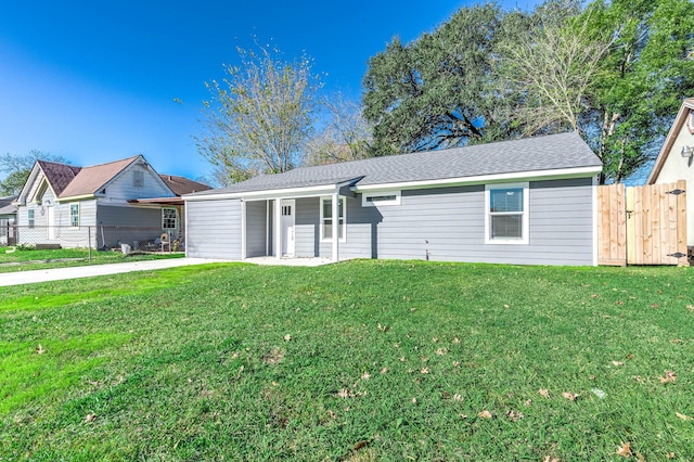 ranch-style home with a front yard