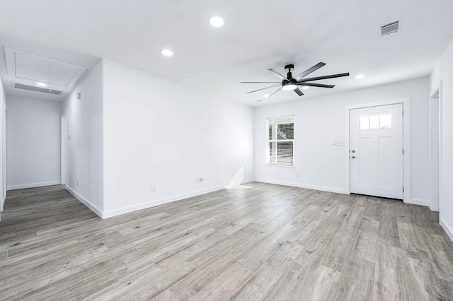 interior space with ceiling fan and light hardwood / wood-style flooring