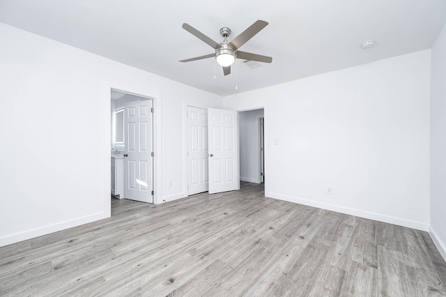 unfurnished bedroom with ceiling fan and light hardwood / wood-style floors