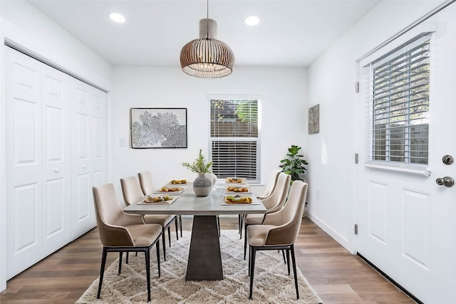 dining area with dark hardwood / wood-style flooring and breakfast area