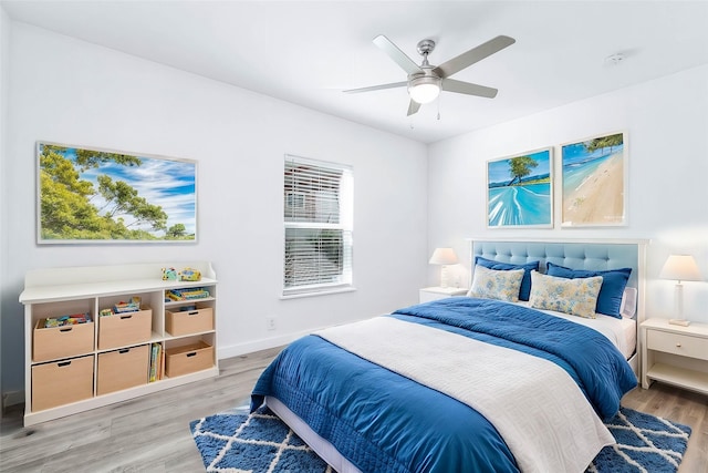 bedroom featuring ceiling fan and hardwood / wood-style flooring