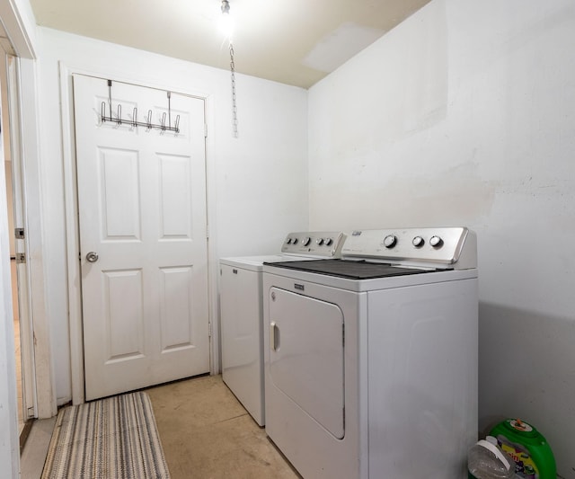 washroom featuring separate washer and dryer