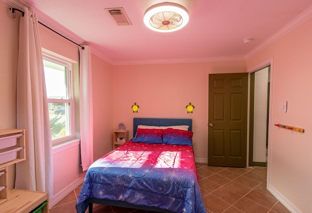 bedroom featuring multiple windows, tile patterned flooring, and ornamental molding