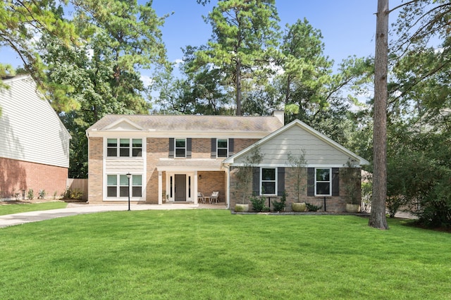 view of front facade featuring a front yard