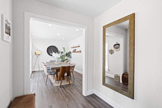 dining area with wood-type flooring