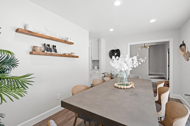 dining area featuring light wood-type flooring