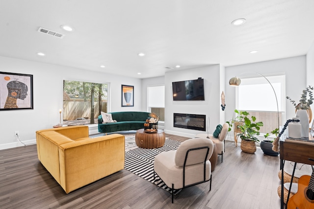 living room featuring dark wood-type flooring