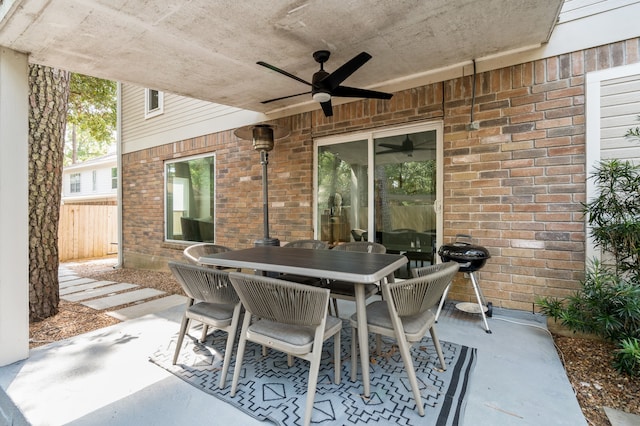 view of patio featuring ceiling fan