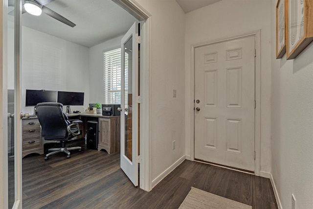 office space with dark hardwood / wood-style floors and ceiling fan