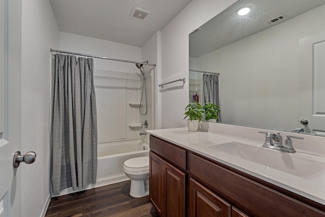 full bathroom with shower / bathtub combination with curtain, vanity, toilet, and wood-type flooring