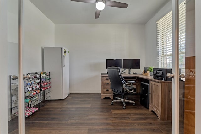 office area featuring ceiling fan and dark wood-type flooring