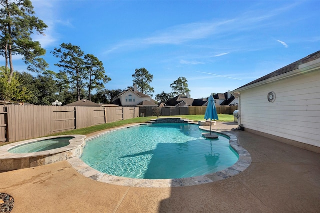 view of swimming pool with a patio and an in ground hot tub