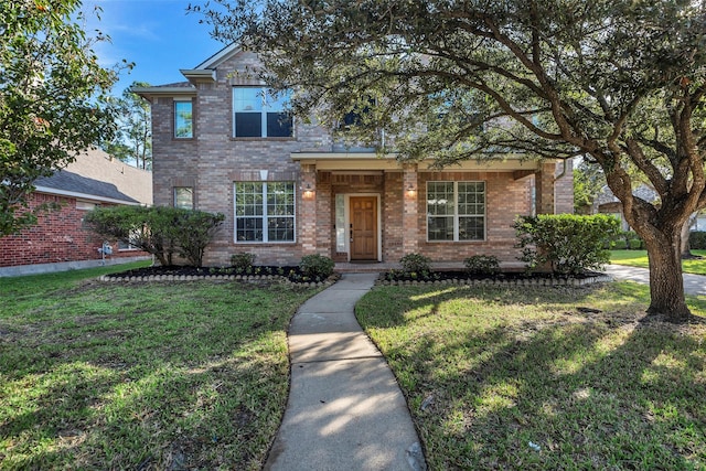 view of front of property featuring a front lawn