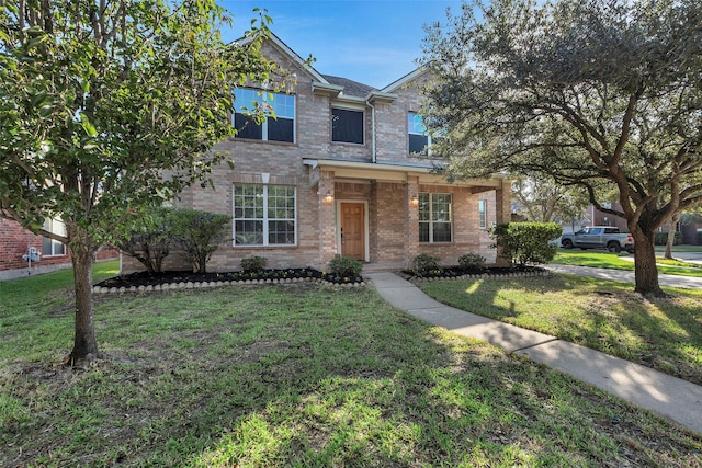 view of front of home featuring a front yard