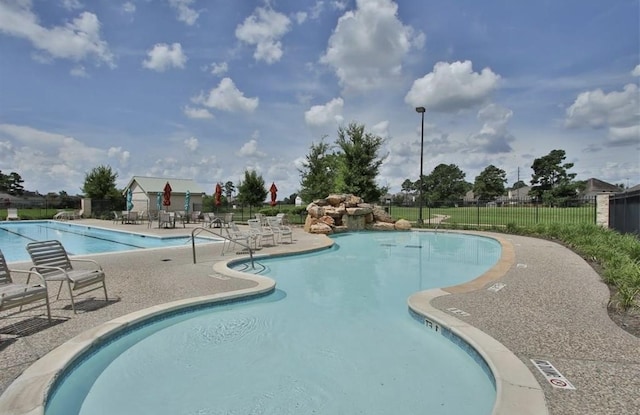 view of pool with a patio area