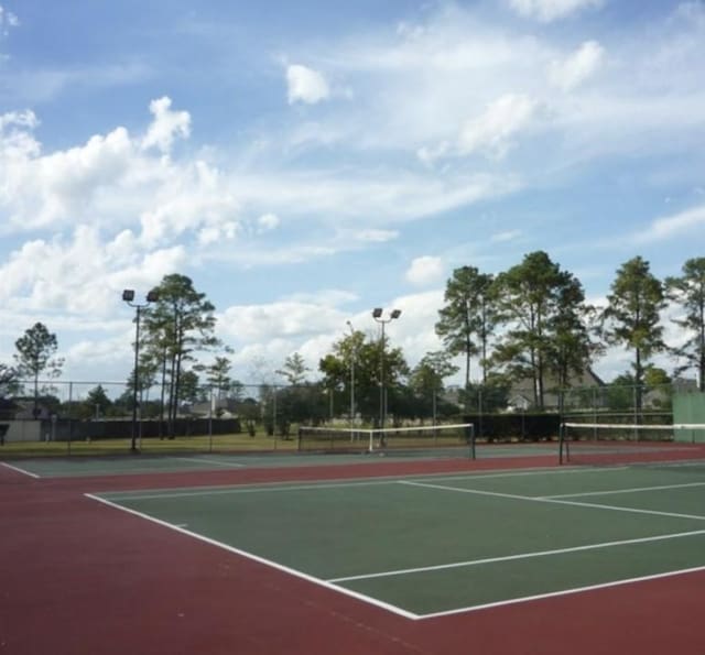 view of tennis court with basketball court