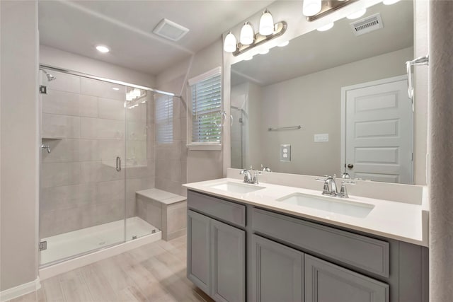 bathroom featuring vanity and walk in shower