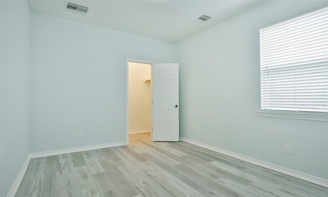 empty room featuring light wood-type flooring