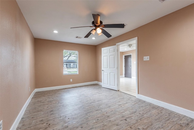 unfurnished bedroom featuring light hardwood / wood-style flooring and ceiling fan