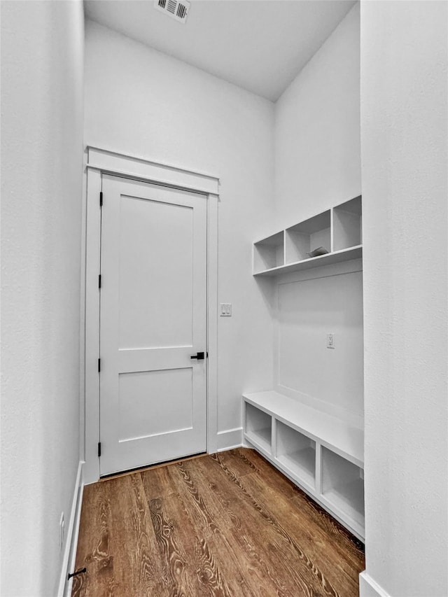 mudroom with hardwood / wood-style flooring