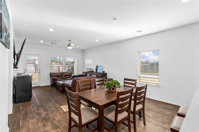 dining room with dark hardwood / wood-style floors and ceiling fan