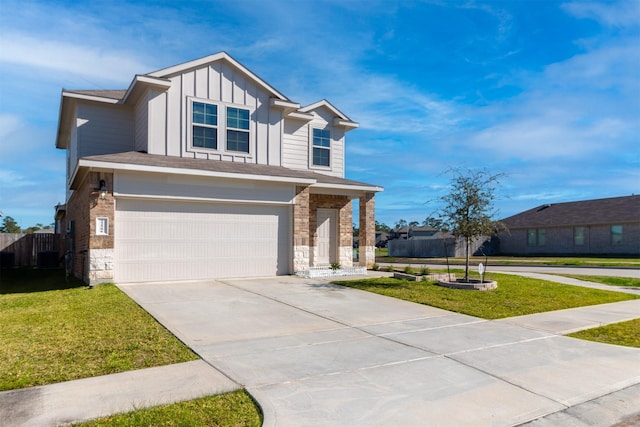 craftsman-style house featuring a front yard and a garage