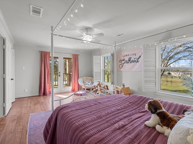 bedroom featuring light hardwood / wood-style floors, french doors, ornamental molding, access to outside, and ceiling fan