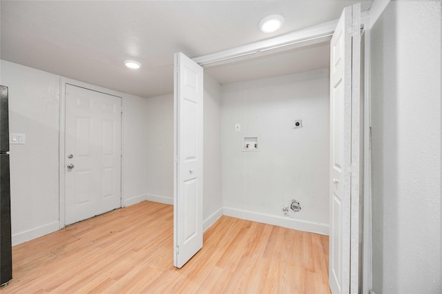 washroom with washer hookup, gas dryer hookup, light wood-type flooring, and hookup for an electric dryer