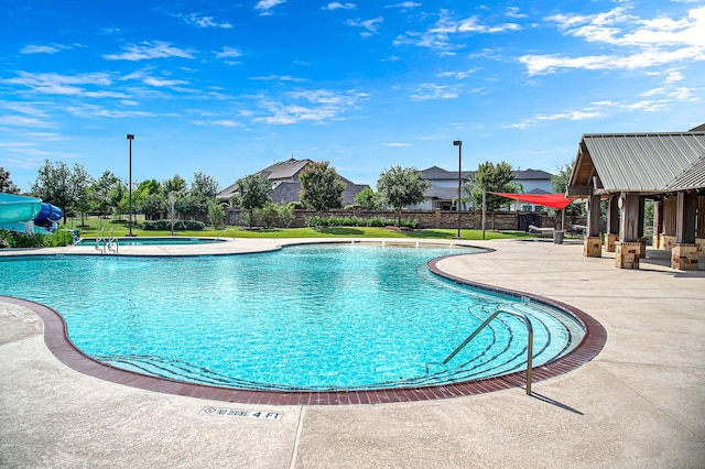 view of pool with a patio