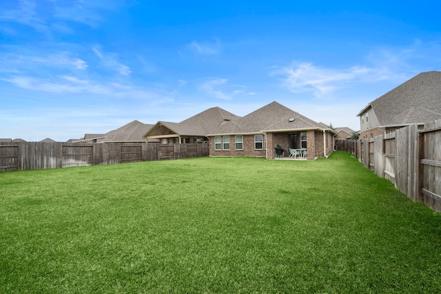 view of yard with a patio area