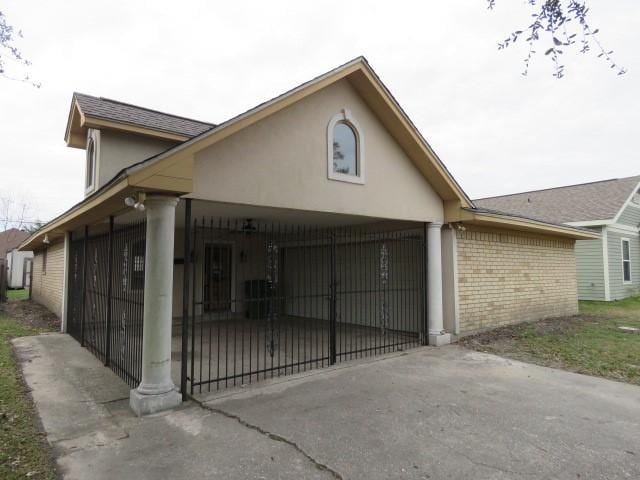 view of front facade with a carport