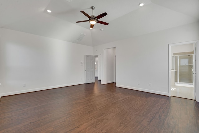 empty room featuring ceiling fan, dark hardwood / wood-style flooring, and lofted ceiling